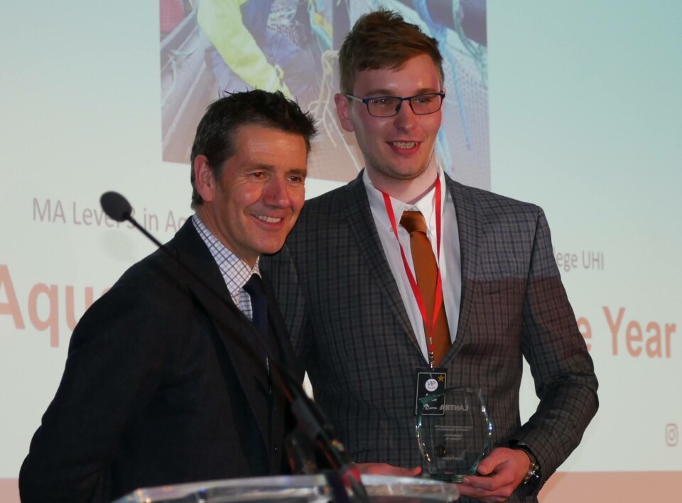 Marine Harvest apprentice Scott Forder, right, receives his runners-up award from ceremony host Dougie Vipond. Photo: FFE